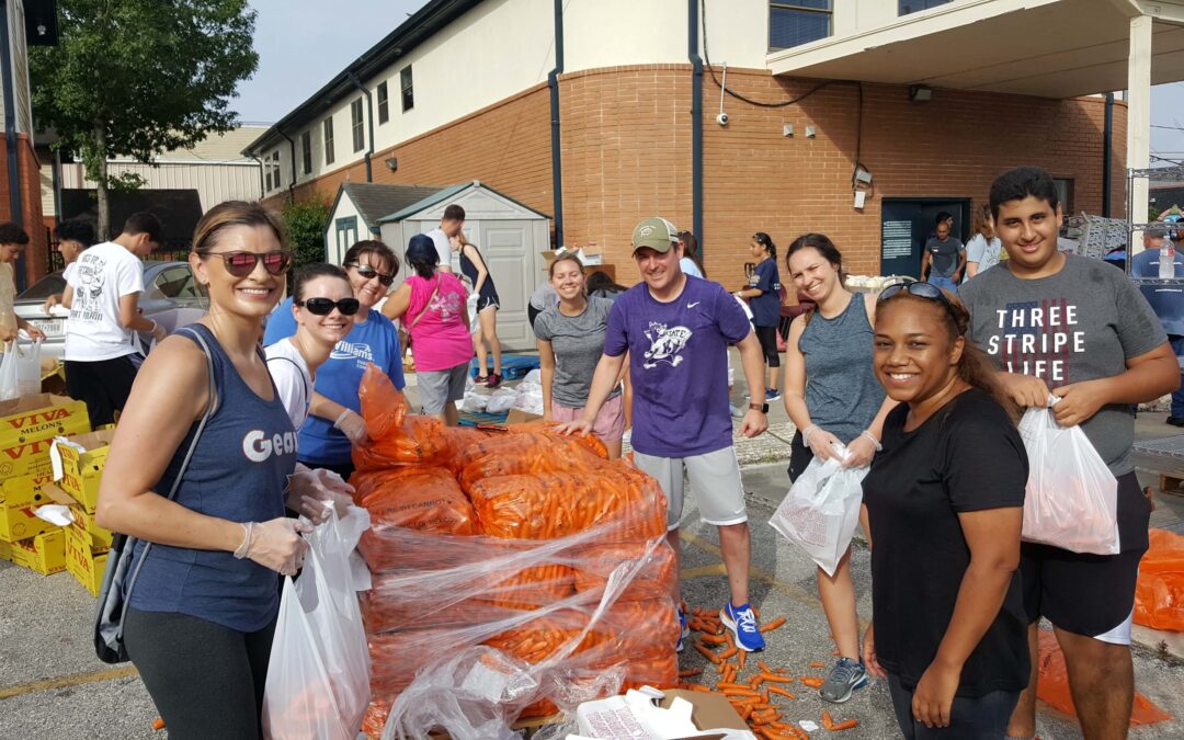 Young Leaders Service Day at Catholic Charities’ Guadalupe Center Food Fair