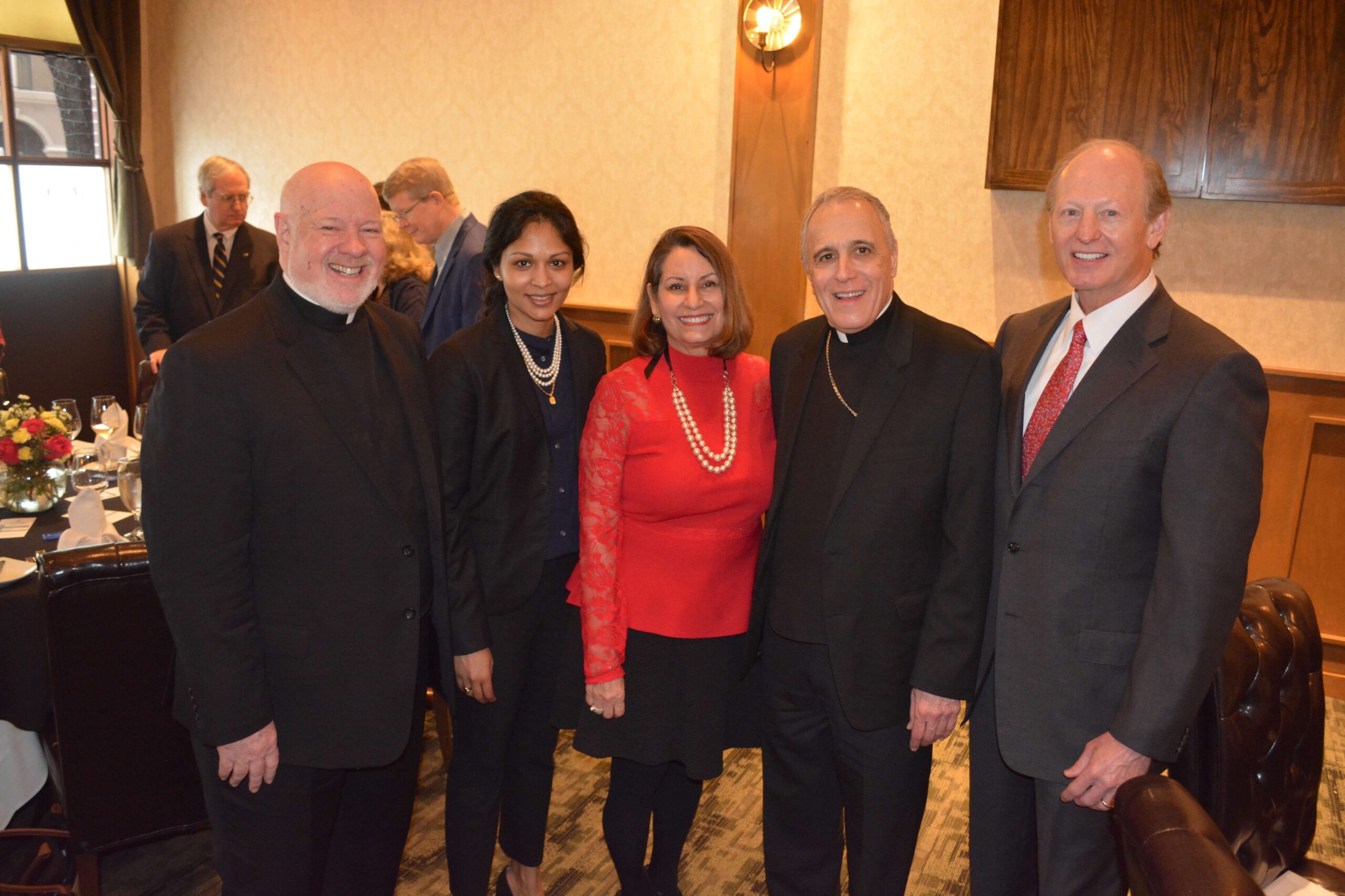 Monsignor Sullivan and Marion Boteju from Catholic Charities New York with His Eminence Daniel Cardinal DiNardo, Catholic Charities President Cynthia N Colbert and Board Chair Kevin K Rech.