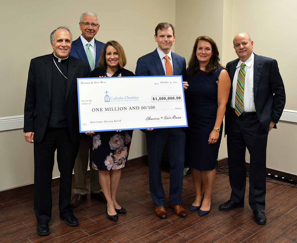 Eric and Shanna Bass donate $1 million to Catholic Charities for Harvey relief.