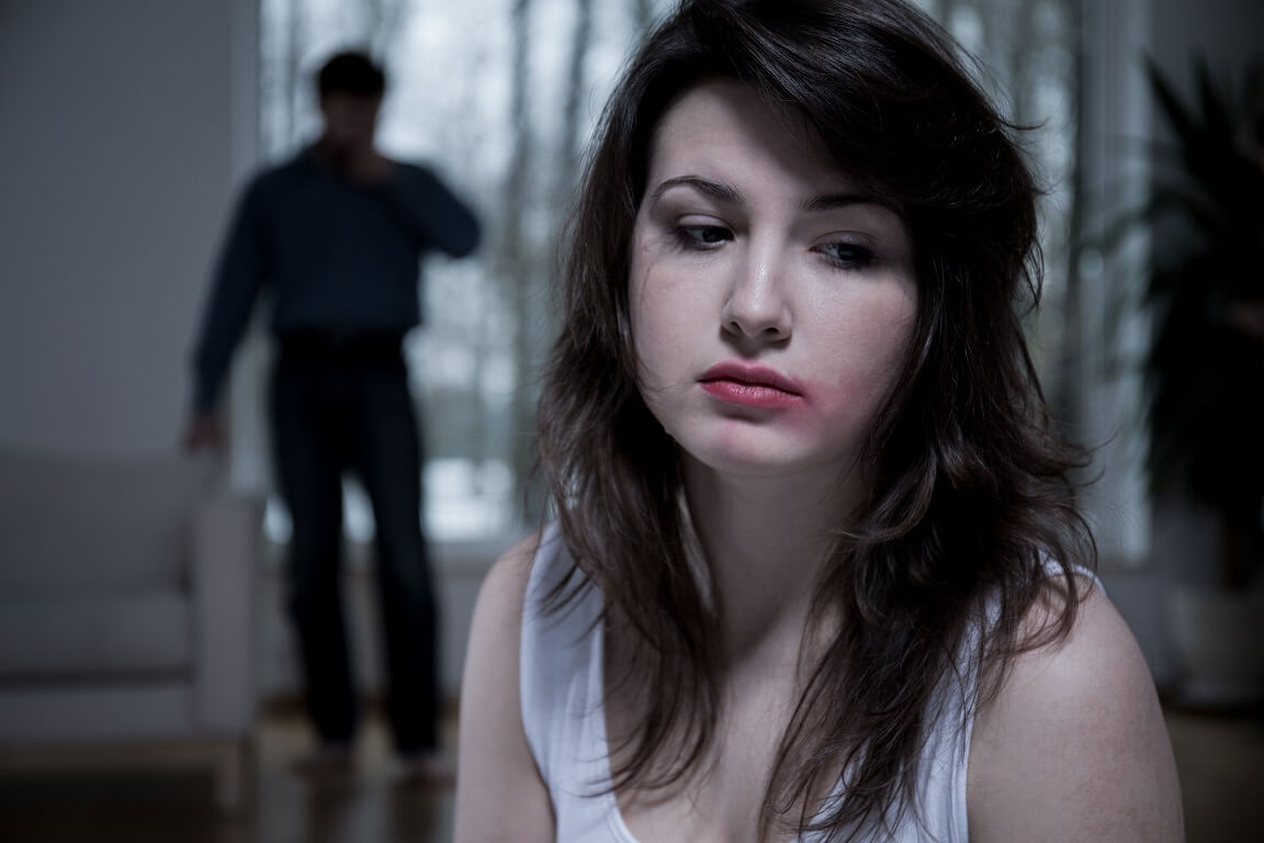 Horizontal view of victim of domestic abuse